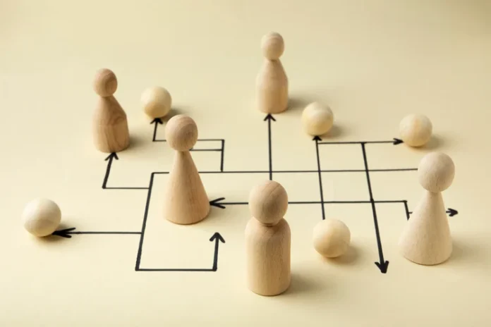 high-angle-wooden-pawns-arrangement