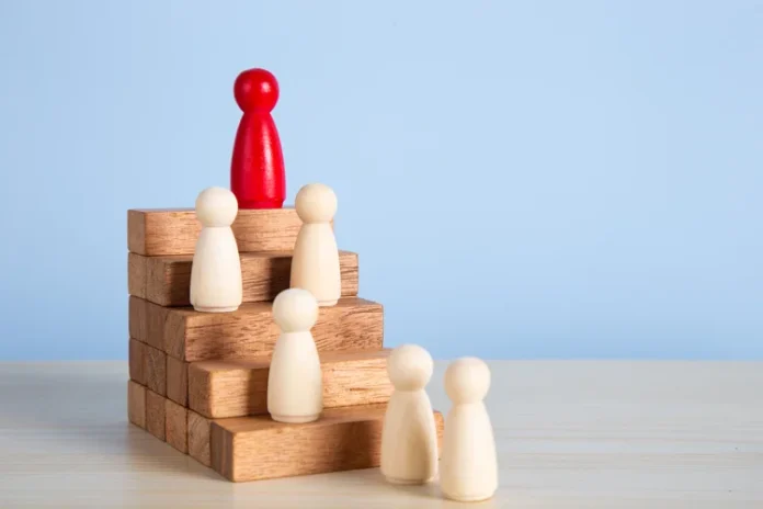 wooden-people-figures-on-top-of-wooden-blocks-car-2026-01-07-00-37-02-utc